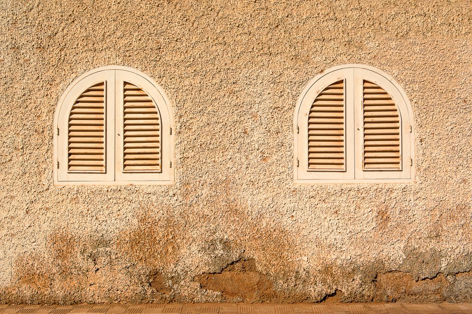 Classic wooden plantation shutters installed in a home