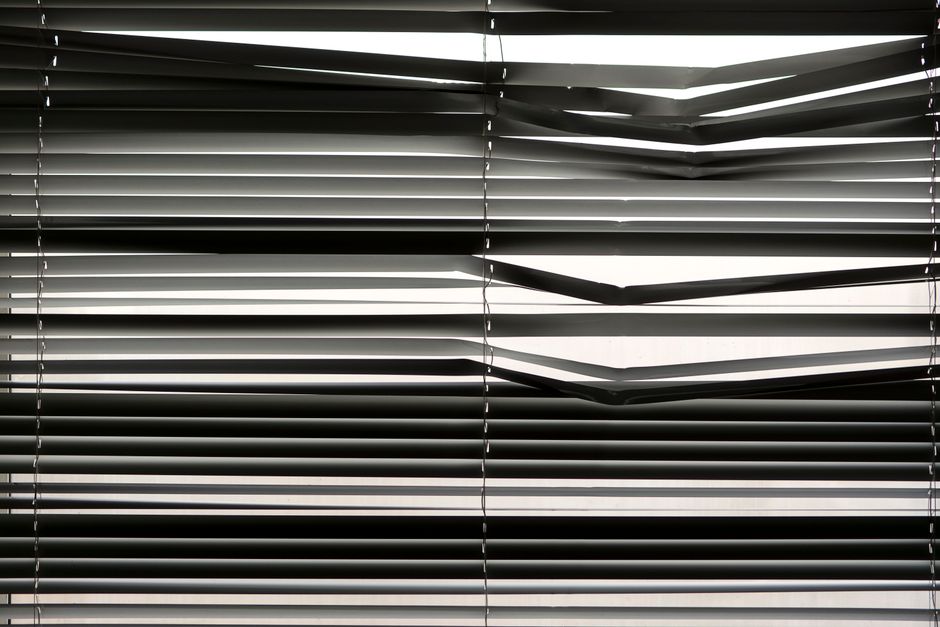 Modern roller window shades in a brightly lit room